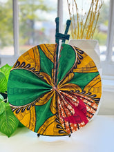 Load image into Gallery viewer, Handmade African Ankara Print Fabric Fan β Wax Print Folding Fan with Leather-Wrapped Handle