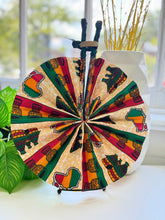 Load image into Gallery viewer, Handmade African Ankara Print Fabric Fan – Wax Print Folding Fan with Leather-Wrapped Handle
