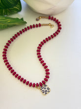 Load image into Gallery viewer, Handmade Red Glass Bead Necklace with Gold Spacers and Crystal Leopard Clover Pendant
